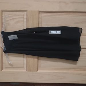 Black sleeveless Blouse; sheer top layer; solid black 2nd layer; 2 button back